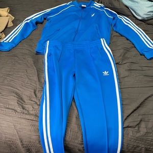 Adidas track suit size medium